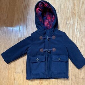 Carter’s boy’s peacoat style jacket. Navy blue. Size 2T.